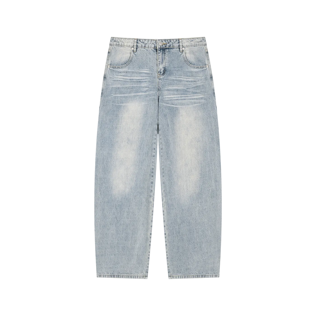 Jeans azules pierna ancha getabbe con lavado enzyme wash vintage, desgaste en muslos, corte holgado balloon, talle medio, bolsillos frontales, fondo blanco